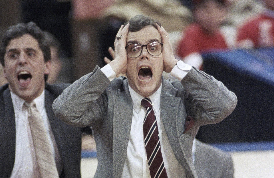 FILE - DePaul coach Joey Meyer reacts to his team's play against LSU in an NCAA men's college basketball tournament Midwest Regional semifinal in Cincinnati, March 20, 1987. Meyer, who played at DePaul and coached the Blue Demons to seven NCAA Tournament appearances in 13 seasons, has died. He was 74. Meyer died Friday, Dec. 29, 2023, in the Chicago suburb of Hinsdale, surrounded by family, DePaul said in a release. The school did not provide any further information. (AP Photo/Al Behrman, File)