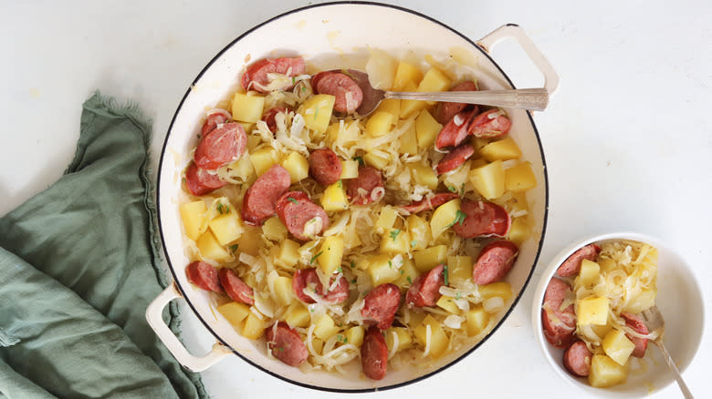 kielbasa and sauerkraut served in a pan