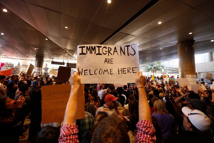 Hundreds of people protest President Donald Trump’s travel ban at the Tom Bradley International Terminal at LAX on January 29, 2017. (Getty)