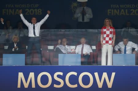 Soccer Football - World Cup - Final - France v Croatia - Luzhniki Stadium, Moscow, Russia - July 15, 2018 President of France Emmanuel Macron celebrates after France win the World Cup next to spouse Brigitte Macron, FIFA president Gianni Infantino, President of Russia Vladimir Putin and President of Croatia Kolinda Grabar-Kitarovic REUTERS/Damir Sagolj