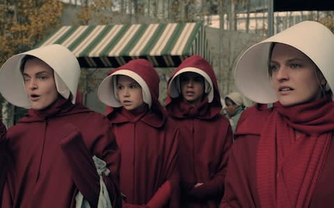 Elisabeth Moss (r) in TV's The Handmaid's Tale - Credit: MGM