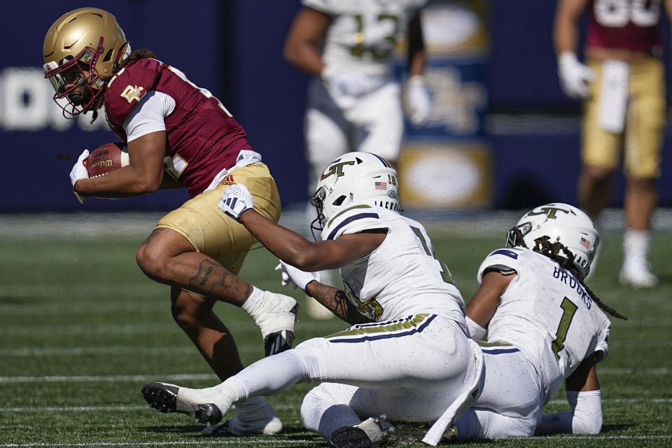 Boston College wide receiver Lewis Bond (11) makes the catch against Georgia Tech during the second half of an NCAA college football game, Saturday, Oct. 21, 2023, in Atlanta. Boston College won 38-23. (AP Photo/Mike Stewart)