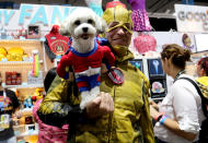 <p>Cosplayer dressed as the Flash from DC Comics and his superhero dog at Comic-Con International on July 21, 2018, in San Diego. (Photo: Angela Kim/Yahoo Entertainment) </p>