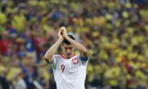 Soccer Football - World Cup - Group H - Poland vs Colombia - Kazan Arena, Kazan, Russia - June 24, 2018 Poland's Robert Lewandowski looks dejected as he applauds the fans at the end of the match REUTERS/Toru Hanai