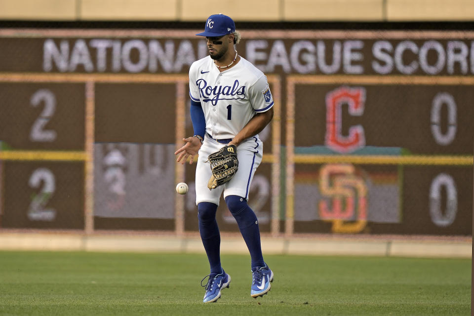 Kansas City Royals right fielder MJ Melendez fields an RBI single by Cincinnati Reds' TJ Friedl during the second inning of a baseball game Tuesday, June 13, 2023, in Kansas City, Mo. (AP Photo/Charlie Riedel)