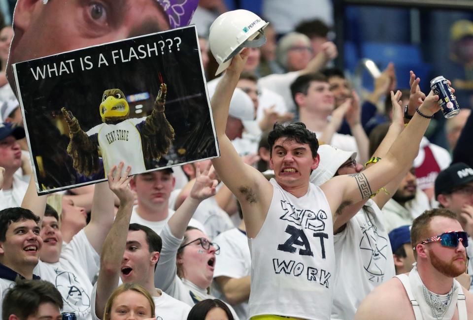 Akron Zips fans cheer during the second half of an NCAA college basketball game, Friday, Feb. 23, 2024, in Akron, Ohio.