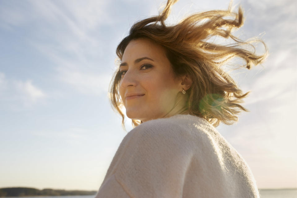 A woman with her hair blowing