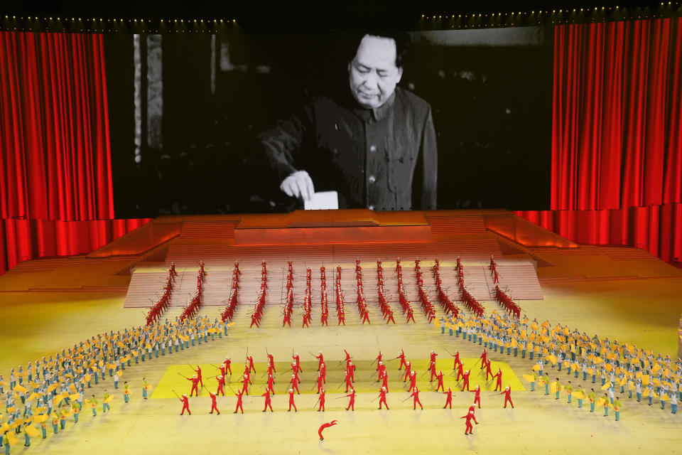 Late Chinese leader Mao Zedong is displayed on screen during a gala show ahead of the 100th anniversary of the founding of the Chinese Communist Party in Beijing on Monday, June 28, 2021. In the build-up to the July 1 anniversary, Chinese President Xi Jinping and the party have exhorted its members and the nation to remember the early days of struggle in the inland hills of Yan'an, where Mao emerged as party leader in the 1930s. (AP Photo/Ng Han Guan)