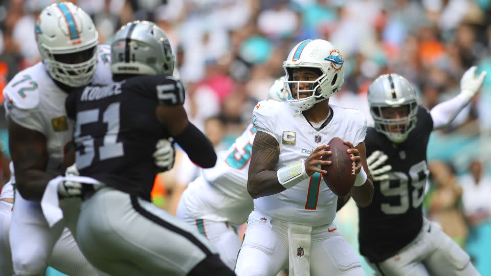 Miami Dolphins quarterback Tua Tagovailoa looks for a passing option against the Las Vegas Raiders. - Sam Navarro/USA TODAY Sports/Reuters