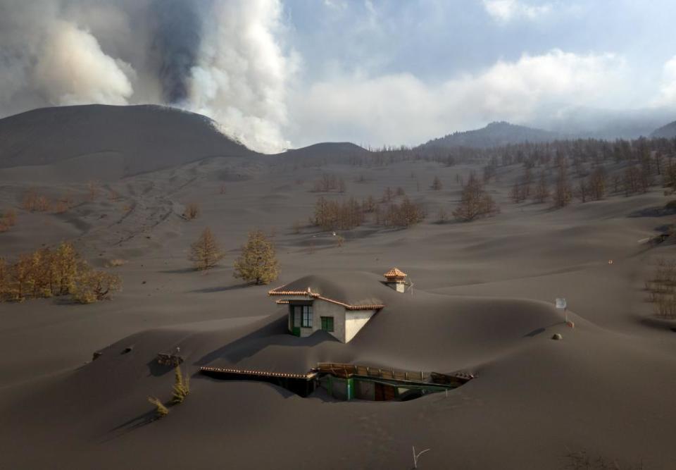 A house covered in volcanic ash on La Palma, Spain