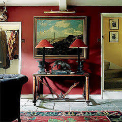 A deep, gorgeous red saturates this space. The contrasting blues in the painting are offset by theâ€¦