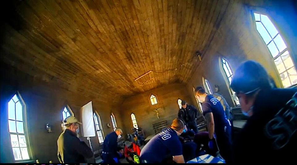 In this image from video released by the Santa Fe County Sheriff's Office, is the scene inside a small church on a movie set following a fatal shooting last year in Santa Fe.