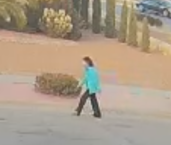 El Paso police released this photo of a woman in a green sweater suspected in the fatal Christmas Day hit-and-run that led to the death of a motorcyclist on George Dieter Drive and Rex Baxter Drive.