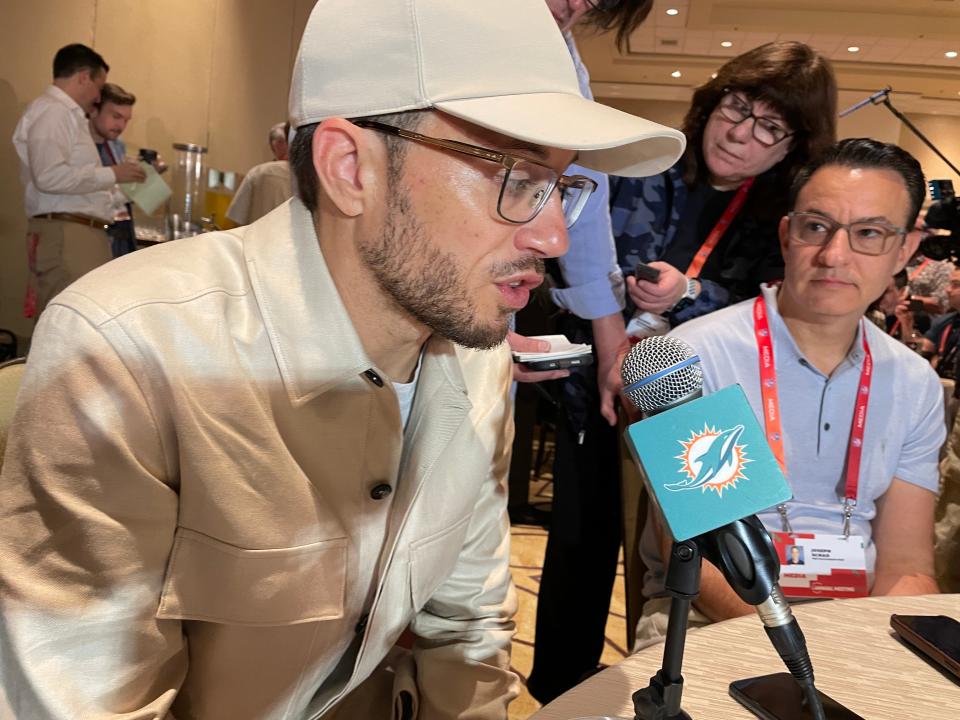 Dolphins coach Mike McDaniel speaks with reporters at the NFL's annual meeting in Orlando.