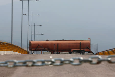 A fuel tank blocks the vehicular passage on Tienditas cross-border bridge between Colombia and Venezuela, in Cucuta, Colombia, February 6, 2019. REUTERS/Luisa Gonzalez