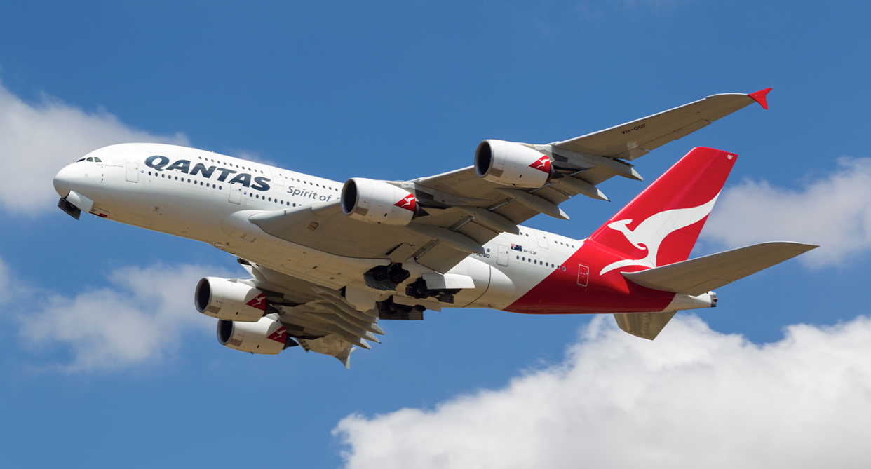 A Qantas plane in the air. 