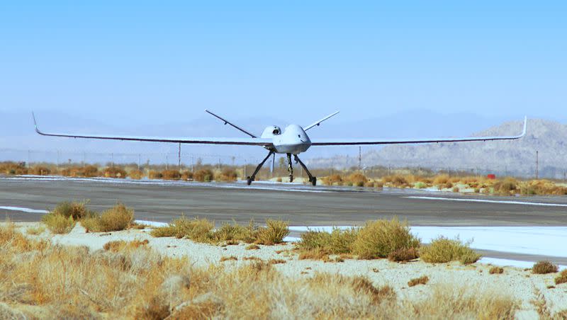 MQ-9 Reaper drone aircraft is pictured on a runway in this 2018 Business Wire photograph. The U.S. military reported that a Russian jet flew in front of a U.S. Reaper drone intentionally, causing damage to a propeller and forcing the U.S. to bring it down over international waters. 