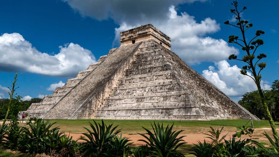 The El Castillo pyramid towers over the ruins at Chichén Itzá in Mexico’s Yucatán Peninsula. Chichén Itzá was one of the largest Maya cities. - Donald Miralle/Getty Images