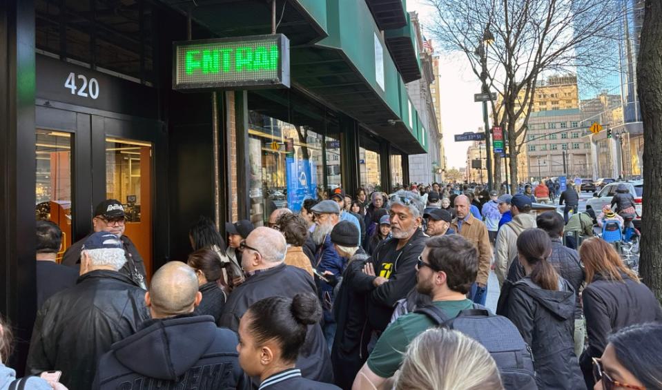 New Yorkers eager to obtain special sunglasses for the eclipse crowded B&H on Sunday. JASON SZENES FOR THE NEW YORK POST