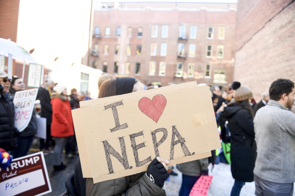 Activists gathered outside a Feb. 11 public hearing in Denver on the Trump administration's proposed update to the National Environmental Policy Act. The second and final public hearing on the proposal was held Tuesday in Washington. (Photo: AAron Ontiveroz/MediaNews Group/The Denver Post via Getty Images)