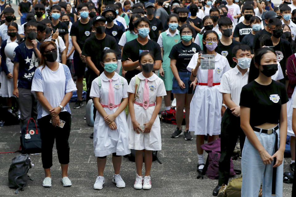 Students gather during a school children's strike event in support of protest movement in Hong Kong Monday, Sept. 30, 2019. Hong Kong authorities Monday rejected an appeal for a major pro-democracy march on National Day’s holiday after two straight days of violent clashes between protesters and police in the semi-autonomous Chinese territory roused fears of more showdowns that would embarrass Beijing. (AP Photo/Gemunu Amarasinghe)