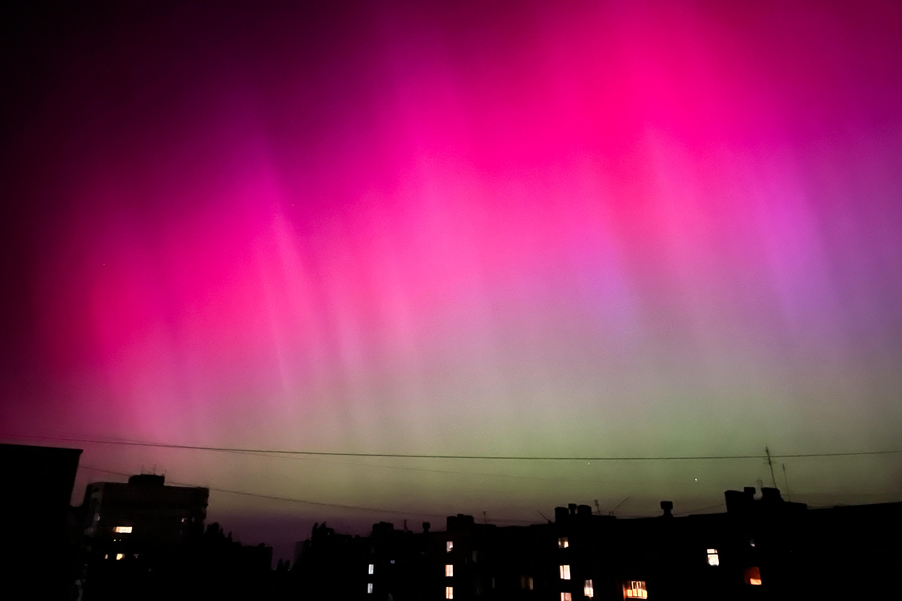 DNIPRO, UKRAINE - MAY 11: The aurora borealis, commonly known as the northern lights, are visible on May 11, 2024 in Dnipro, Ukraine. Northern lights in Ukraine were seen by residents of several regions, first in the south and east, and later in the center and west of the country. (Photo by Artem Tsehelnyk/Suspilne Ukraine/JSC 