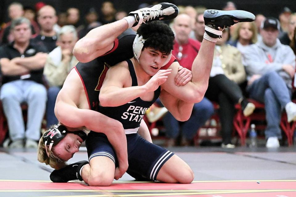 Penn State’s Beau Bartlett scrambles with Maryland’s Kal Miller in their 141-pound bout of the Nittany Lions’ 42-6 win on Sunday. Bartlett defeated Miller, 11-1.
