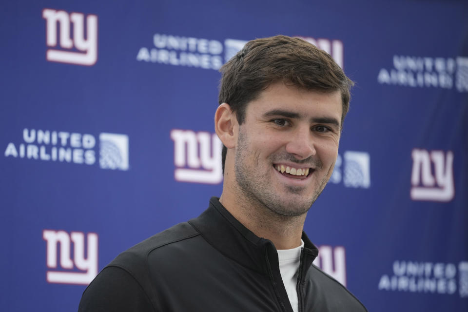 New York Giants quarterback Daniel Jones (8) speaks during a news conference at Hanbury Manor in Ware, England, Friday, Oct. 7, 2022 ahead the NFL game against Green Bay Packers at the Tottenham Hotspur stadium on Sunday. (AP Photo/Kin Cheung)