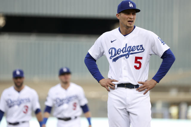 Los Angeles Dodgers shortstop Corey Seager throws out Colorado