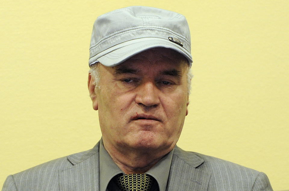 FILE — In this Friday, June 3, 2011 file photo, former Bosnian Serb Gen. Ratko Mladic sits in the court room during his initial appearance at the U.N.'s Yugoslav war crimes tribunal in The Hague, Netherlands. U.N. judges on Tuesday, June 8, 2021 deliver their final ruling on the conviction of former Bosnian Serb army chief Radko Mladic on charges of genocide, war crimes and crimes against humanity during Bosnia’s 1992-95 ethnic carnage. Nearly three decades after the end of Europe’s worst conflict since World War II that killed more than 100,000 people, a U.N. court is set to close the case of the Bosnian War’s most notorious figure. (AP Photo/ Martin Meissner, Pool, File)