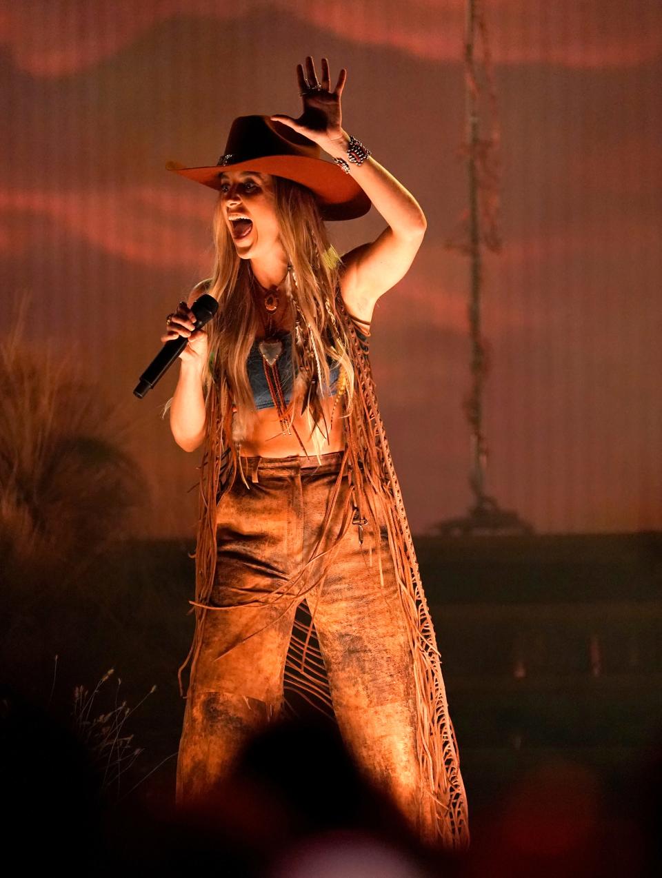 Lainey Wilson performs "Wildflowers and Wild Horses" at the 57th Annual CMA Awards on Wednesday at the Bridgestone Arena in Nashville, Tenn.