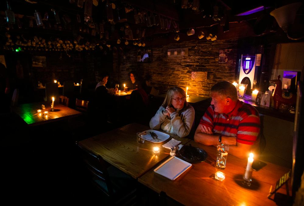 The Masons Arms in Cornwall has replaced lights with candles in an effort to save money. (SWNS)
