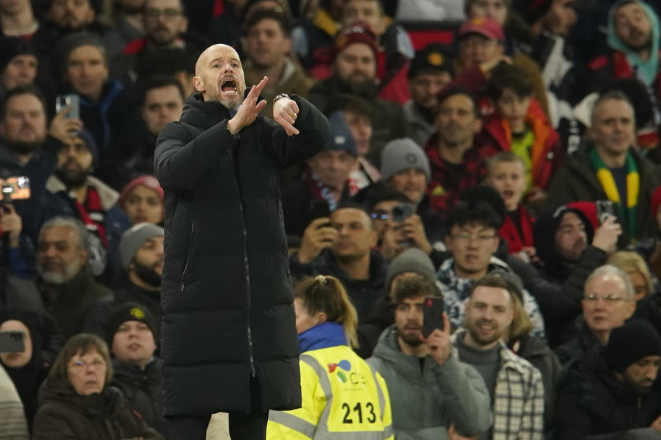 Manchester United's head coach Erik ten Hag gestures during the English Premier League soccer match between Manchester United and Aston Villa at the Old Trafford stadium in Manchester, England, Tuesday, Dec. 26, 2023. (AP Photo/Dave Thompson)