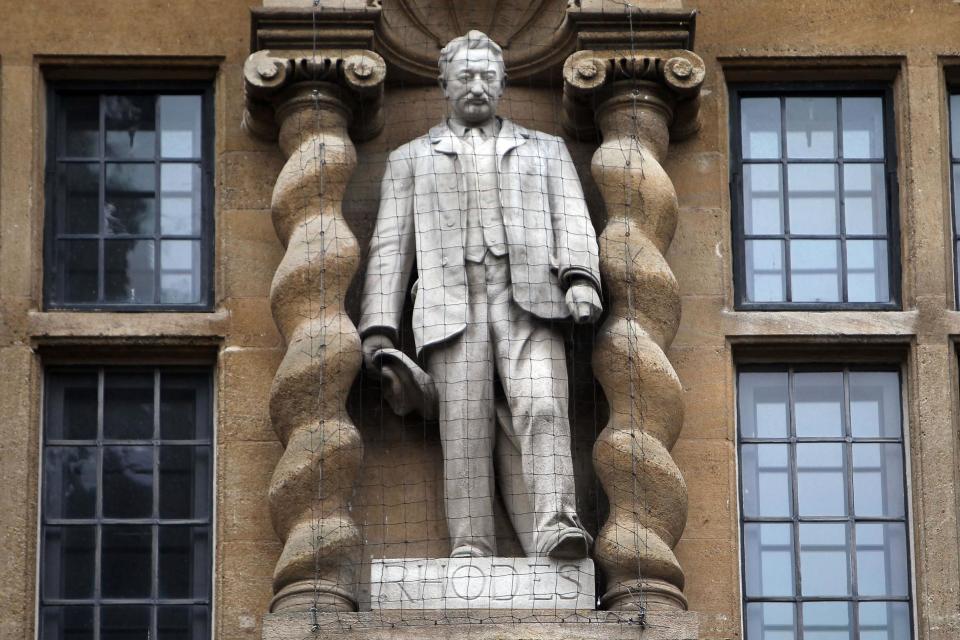 <p>The statue on Oriel college building of British imperialist Cecil Rhodes</p> (PA)