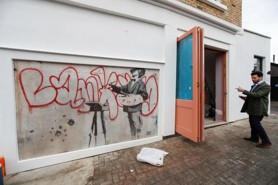 The Banksy mural known as The Painter was unveiled in Notting Hill, London (Picture: Reuters)