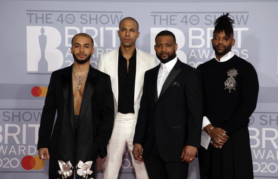 JLS pose for photographers upon arrival at Brit Awards 2020 in London, Tuesday, Feb. 18, 2020.(Photo by Vianney Le Caer/Invision/AP)