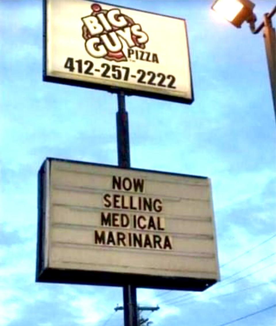 Sign for a pizza place that says "Now selling medical marinara"