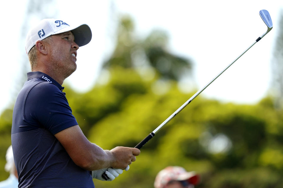 Matt Jones plays his shot from the 11th tee during the final round of the Tournament of Champions golf event, Sunday, Jan. 9, 2022, at Kapalua Plantation Course in Kapalua, Hawaii. (AP Photo/Matt York)