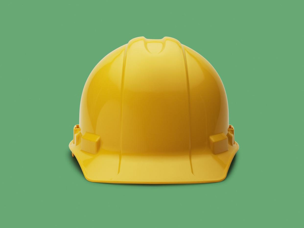 Construction Helmet on green