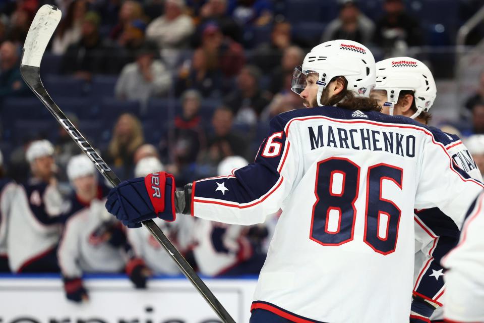 Columbus Blue Jackets right wing Kirill Marchenko (86) celebrates his goal against the Buffalo Sabres during the second period of an NHL hockey game Tuesday, Dec. 19, 2023, in Buffalo, N.Y. (AP Photo/Jeffrey T. Barnes)