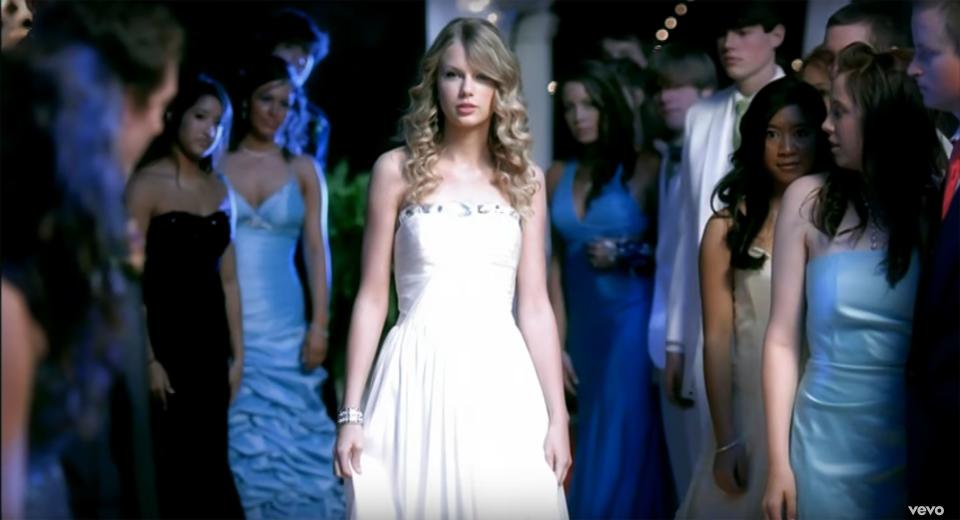 Every great rom-com has an epic makeover, so of course Swift featured one in her music video. As she sings in <em>another</em> fan-favorite track? <a rel="nofollow noopener" href="https://people.com/music/taylor-swift-call-it-what-you-want-love-story/" target="_blank" data-ylk="slk:It's a love story;elm:context_link;itc:0;sec:content-canvas" class="link ">It's a love story</a>, and baby he (in this case, actor Lucas Till) said "Yes!"