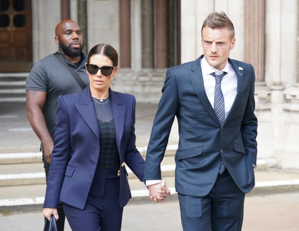 Rebekah Vardy outside the High Court with her husband Jamie (Yui Mok/PA) (PA Wire)