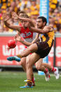 <p>Cyril Rioli kicks for goal.</p>