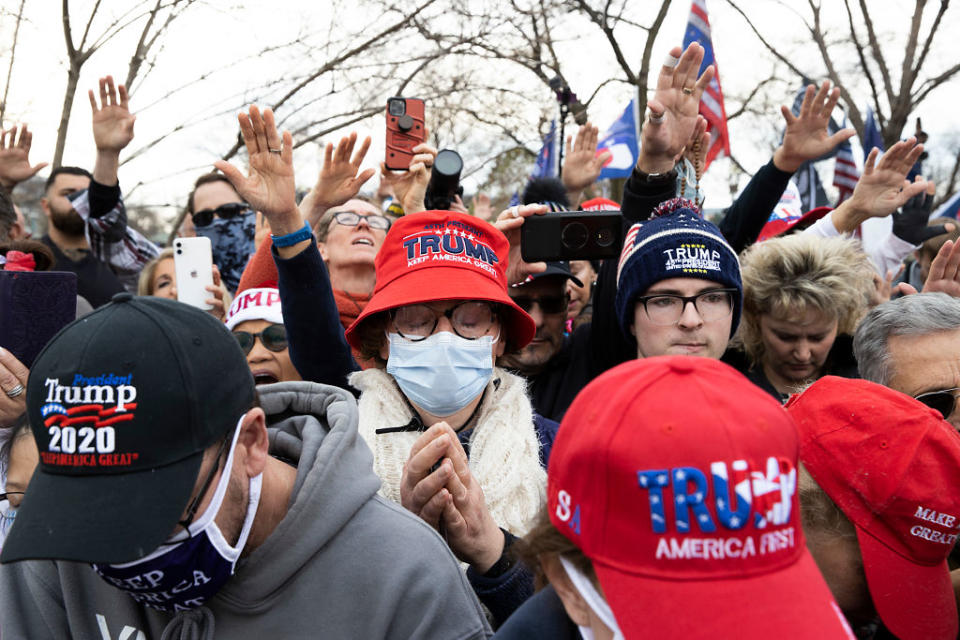 People gather in support of President Donald Trump and in protest the outcome of the 2020 presidential election outside the Supreme Court in Washington, DC. 