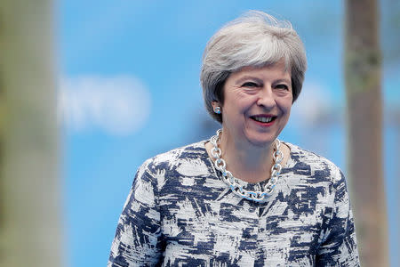 FILE PHOTO: Britain's Prime Minister Theresa May arrives for the second day of a NATO summit in Brussels, Belgium, July 12, 2018. Tatyana Zenkovich/Pool via REUTERS/File Photo