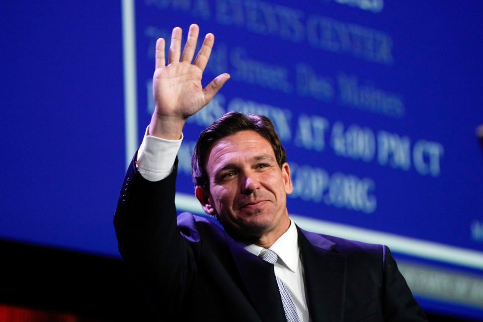 Republican presidential candidate Florida Gov. Ron DeSantis waves at the Republican Party of Iowa's 2023 Lincoln Dinner in Des Moines, Iowa, Friday, July 28, 2023.