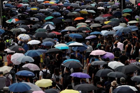 Anti-government protesters march during a protest in central Hong Kong