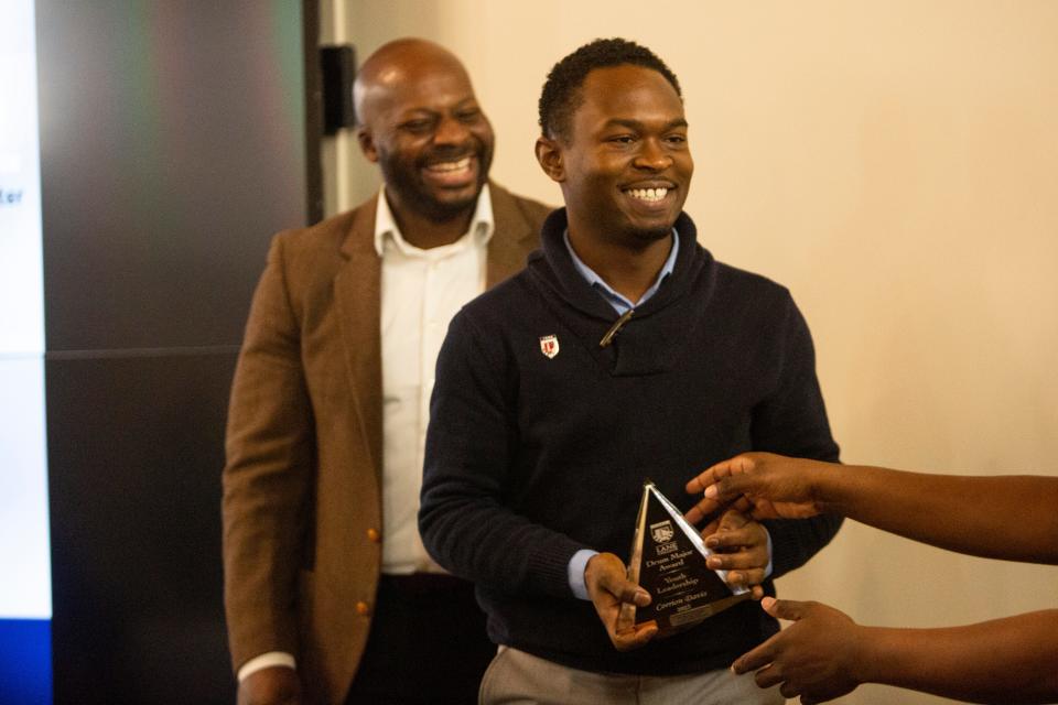 Corrion Davis, Mr. Lane College 2022-2023, smiles as he is given a 2023 Lane College Dr. Martin Luther King Jr. Drum Major Award during the Martin Luther King Jr. Celebration Brunch at Lane College on Monday, January 16, 2023, in Jackson, Tenn. 