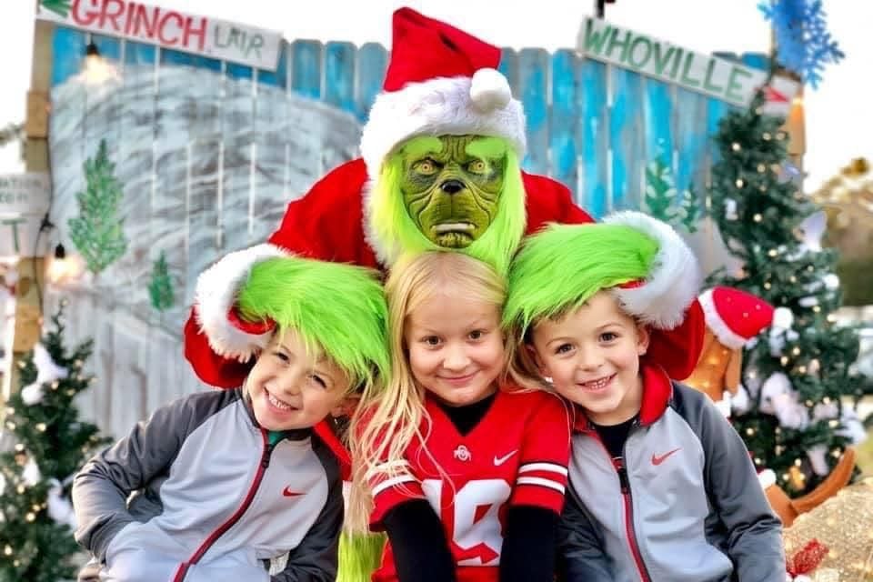 Kids pose with The Grinch at Humphrey Farm during a previous year's Christmas at the Farm.