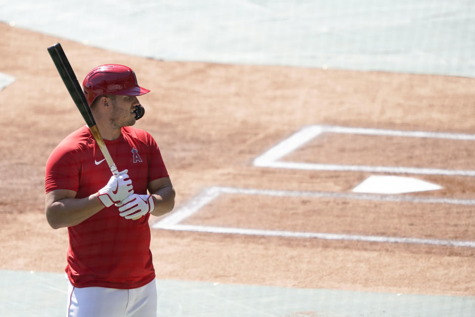 Los Angeles Angels center fielder Mike Trout warms up to bat during baseball practice at Angels Stadium on Saturday, July 4, 2020, in Anaheim, Calif. (AP Photo/Ashley Landis)